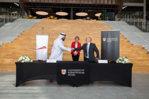 RTA's CEO and University of Birmingham Dubai's Provost shaking hands