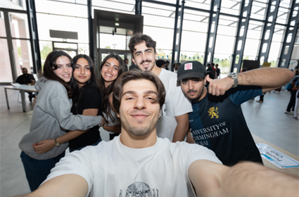 students taking a group selfie