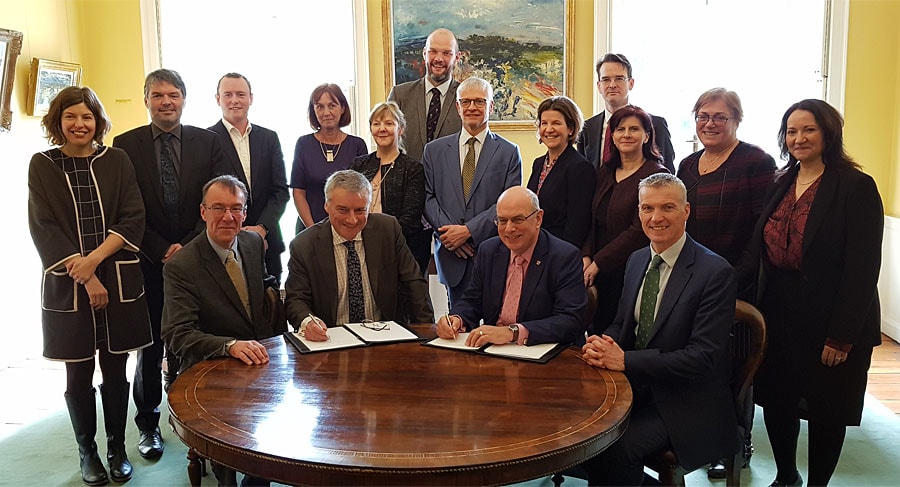 Trinity College Dublin Provost Patrick Prendergast and Vice-Chancellor Professor Sir David Eastwood sign a strategic research and education partnership agreement