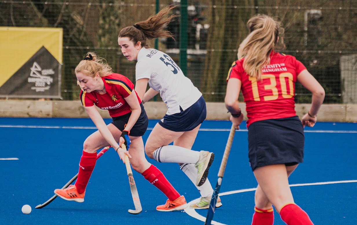 University of Birmingham's women's hockey team in action against an opponent