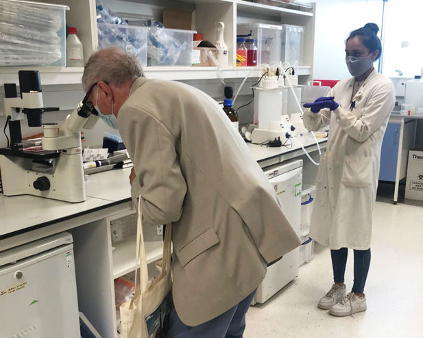 PhD student Himani Rana in lab with donor Robert Spier