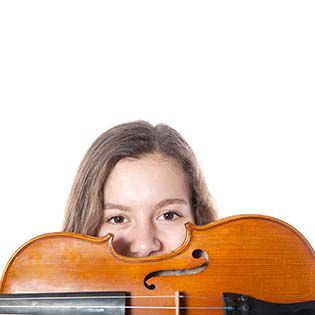 A girl staring straight ahead, the bottom half of her face hidden by a violin.