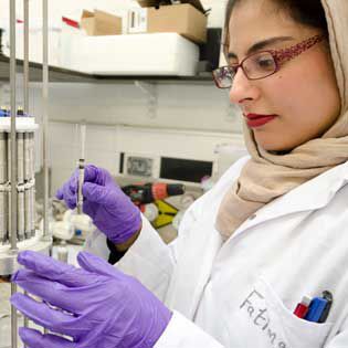 A female scientist working in a lab