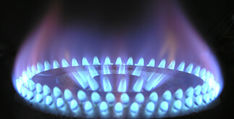 Close-up of gas hob ring flame