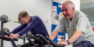 Older men using exercise machines