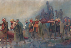 soldiers carrying the injured from the battlefield
