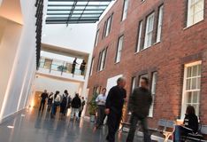 People walking through the Atrium in Birmingham Business School