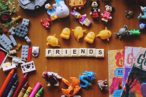 Scrabble tiles spelling 'friends'