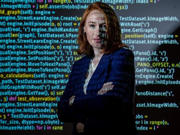 Hannah Fry in front of Code