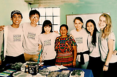 Maria in Guatemala with her international peers and a member of the local community