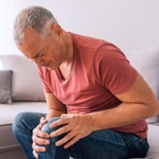 Why do we feel pain when we have arthritis?