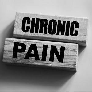 Building blocks spelling out 'chronic pain'