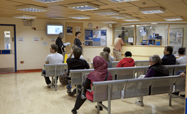 A busy emergency department waiting room in London.