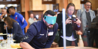 Photo of a man wearing blue blackout goggle taking part in showdown