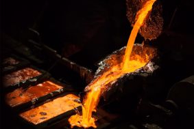 molten metal, being poured into moulds 