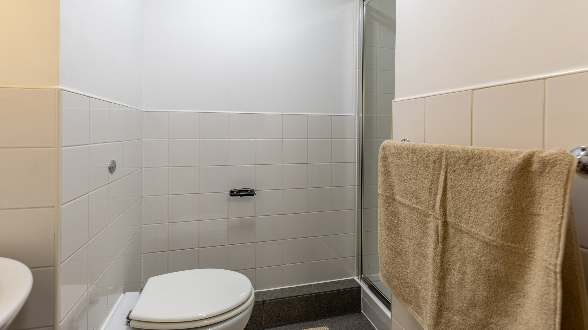 Toilet and towel in the bathroom
