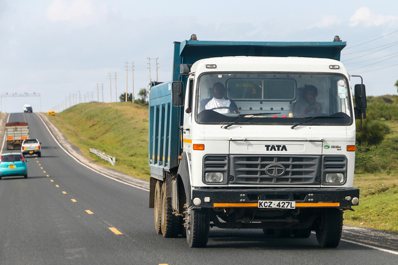 Truck driving on road in Kenya