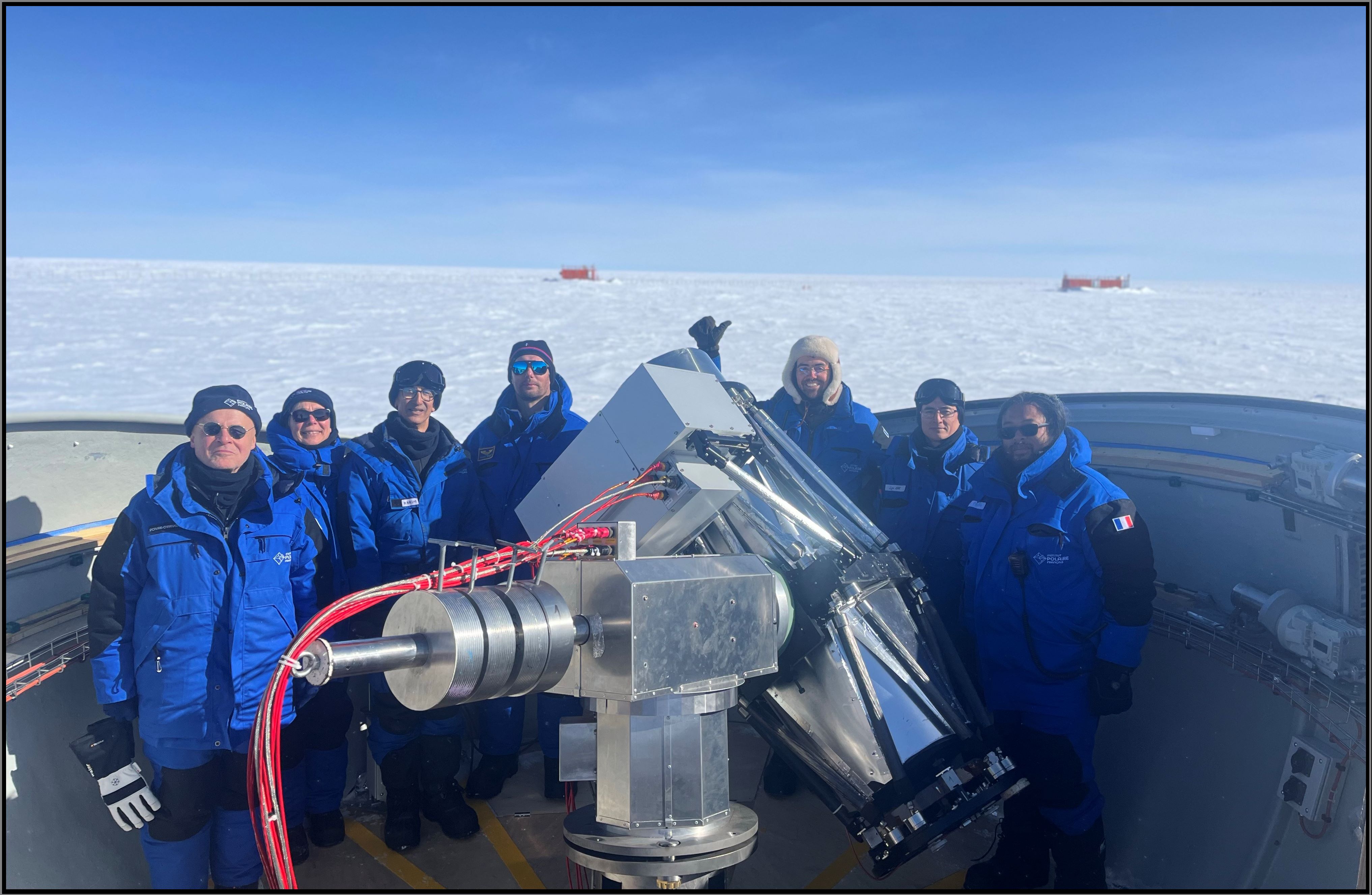 Group of scientists with telescope