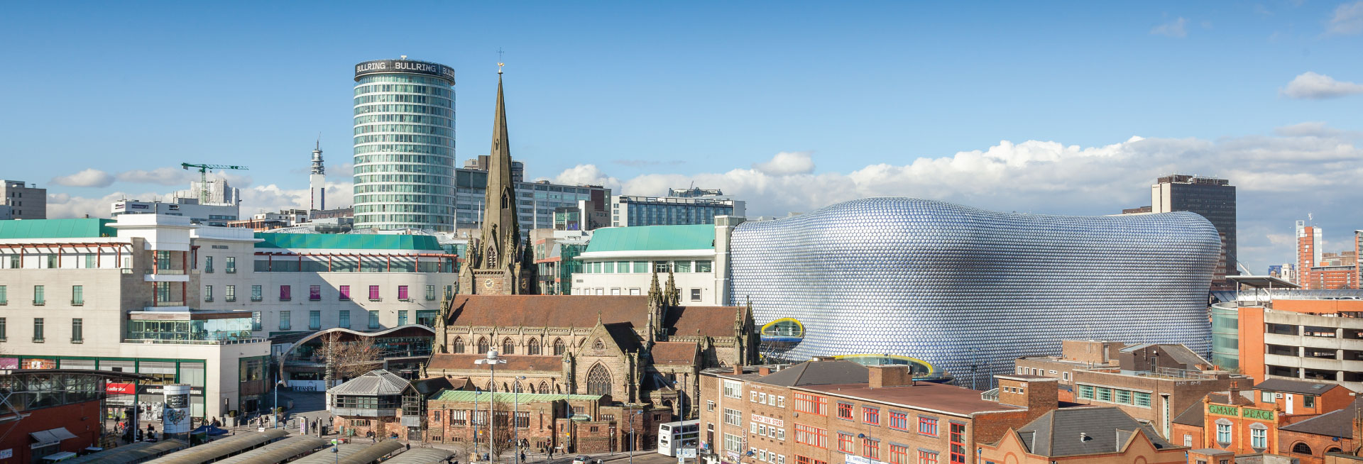 The Birmingham cityscape in daylight.