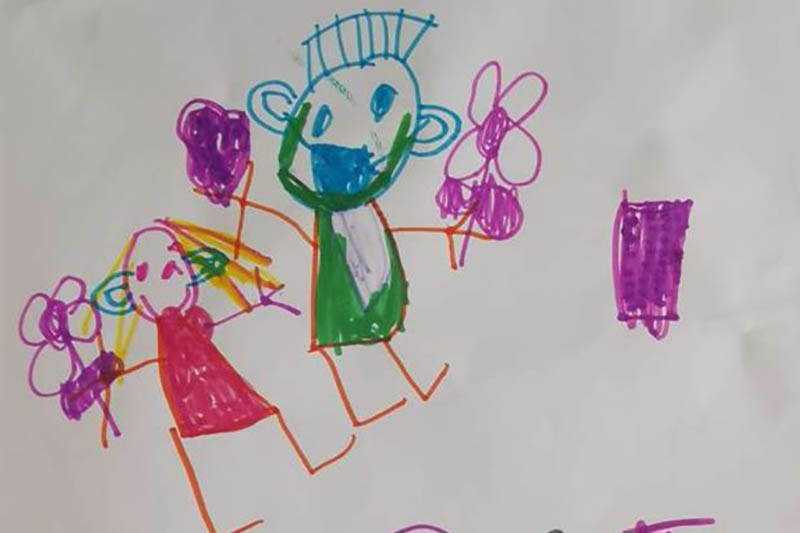 A childs drawing of two people holding flowers