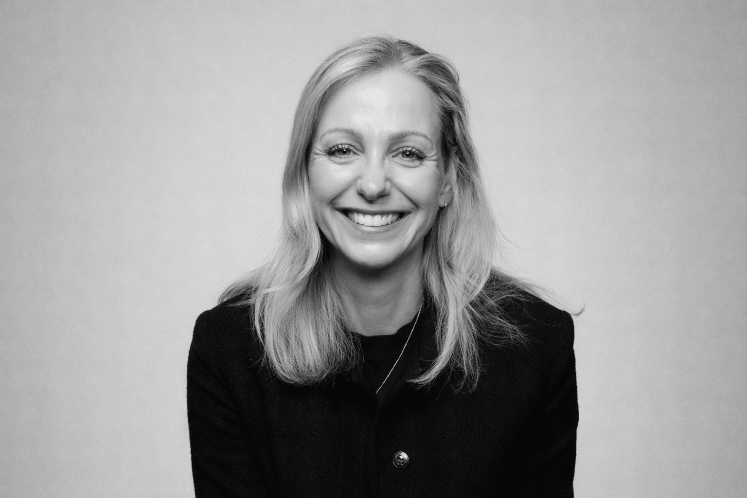 Black and white headshot of Claire Hollands.