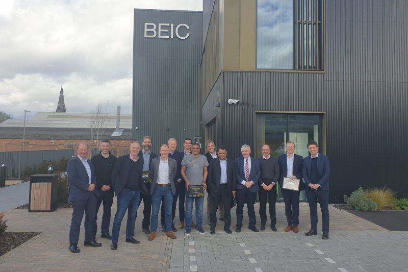 The group of SMEs from the first cohort of the Climate Innovation Platform stand outside the Birmingham Energy Innovation Centre 