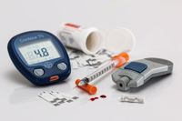 Blood sugar monitor, syringe and medication