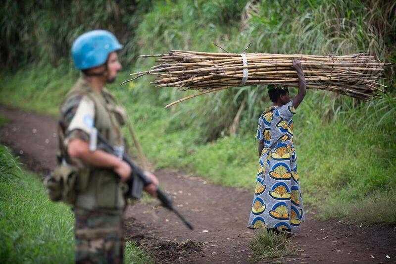 UN Peacekeeper and Congolese woman in the Democratic Republic of Congo