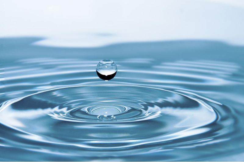 A droplet falling into a pool of water