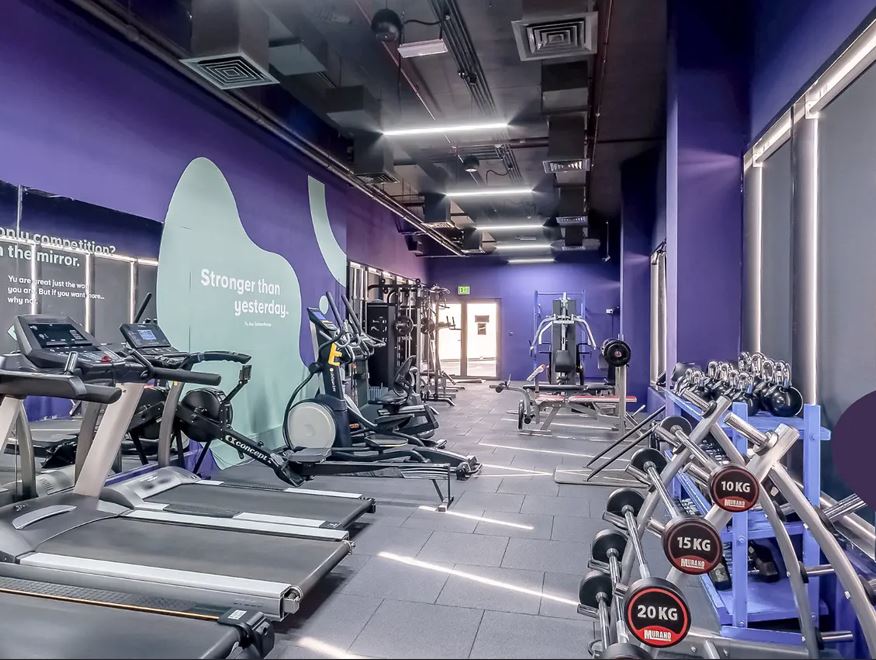 A gym with exercise equipment.