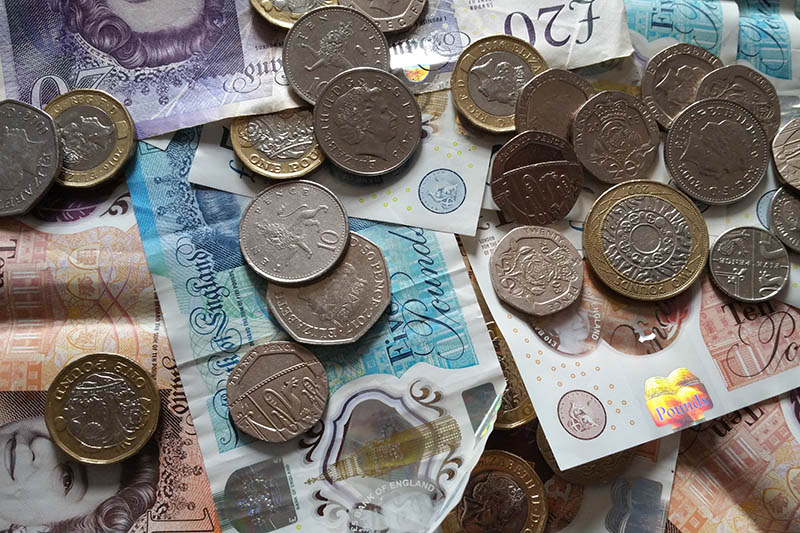 A pile of money on a table