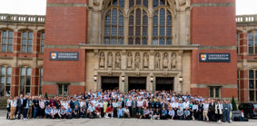 The speakers and attendees gather outside Aston Webb. 