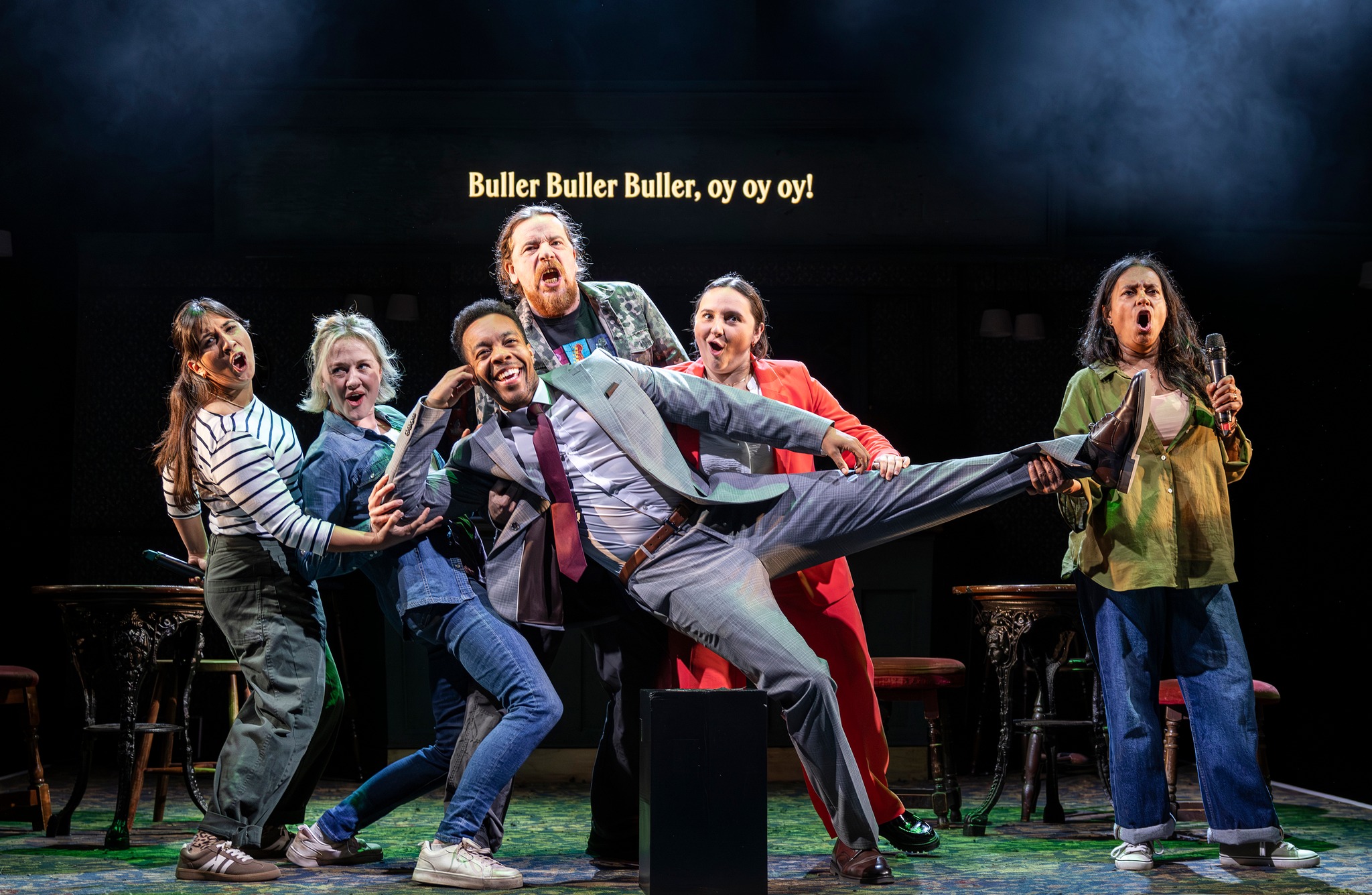 Actors in a scene from the 'Our Public House' play. 