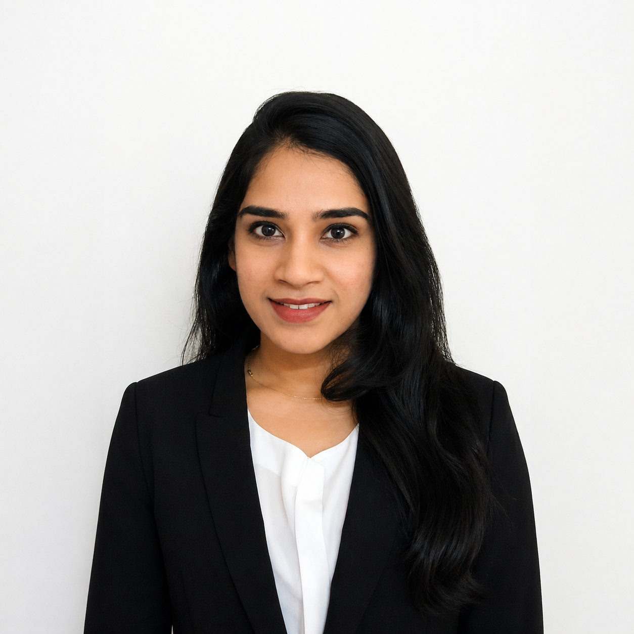 University of Birmingham alumna, Ashita Jain, in front of a white background