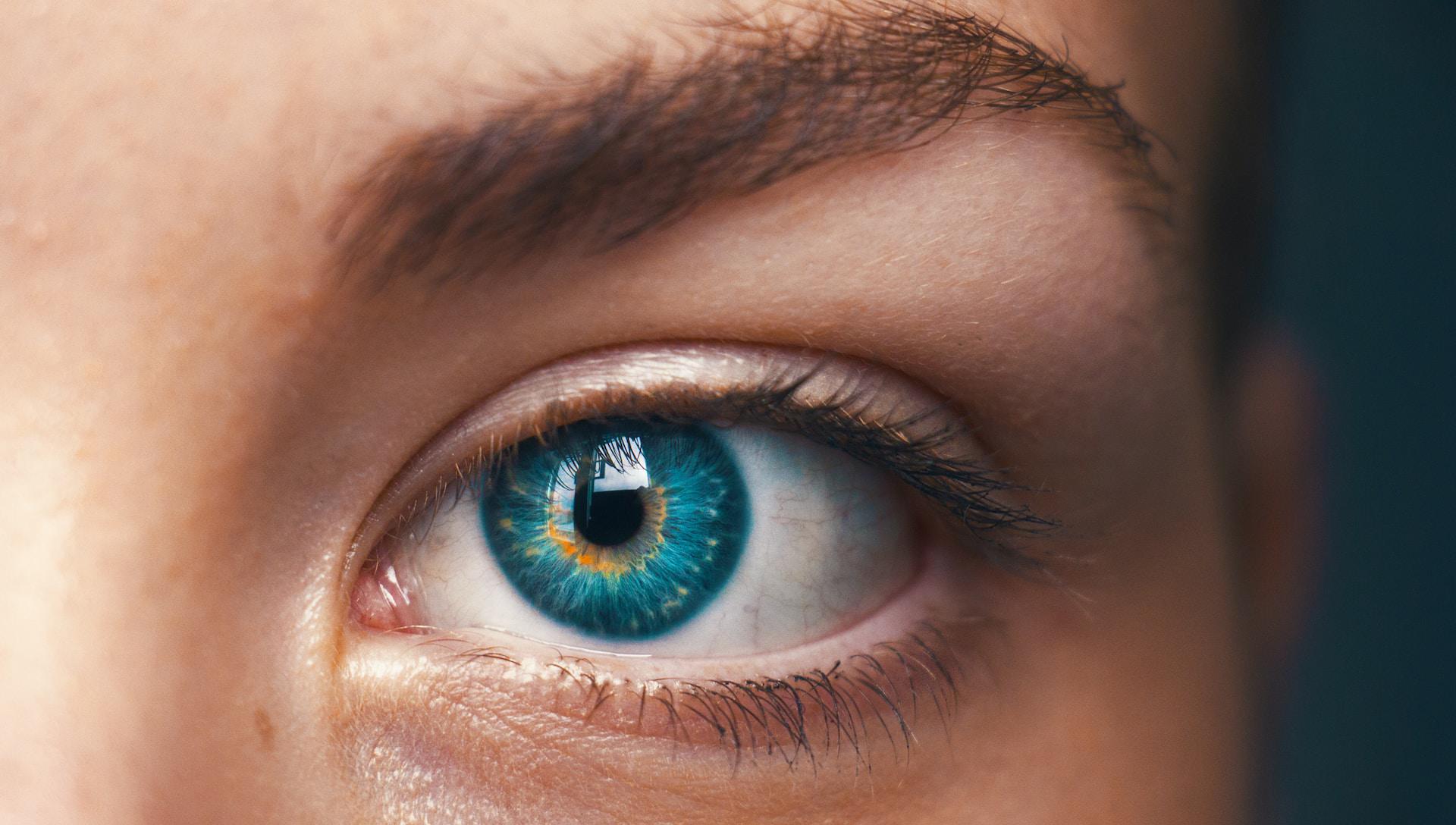 Close-up of human blue eye on female