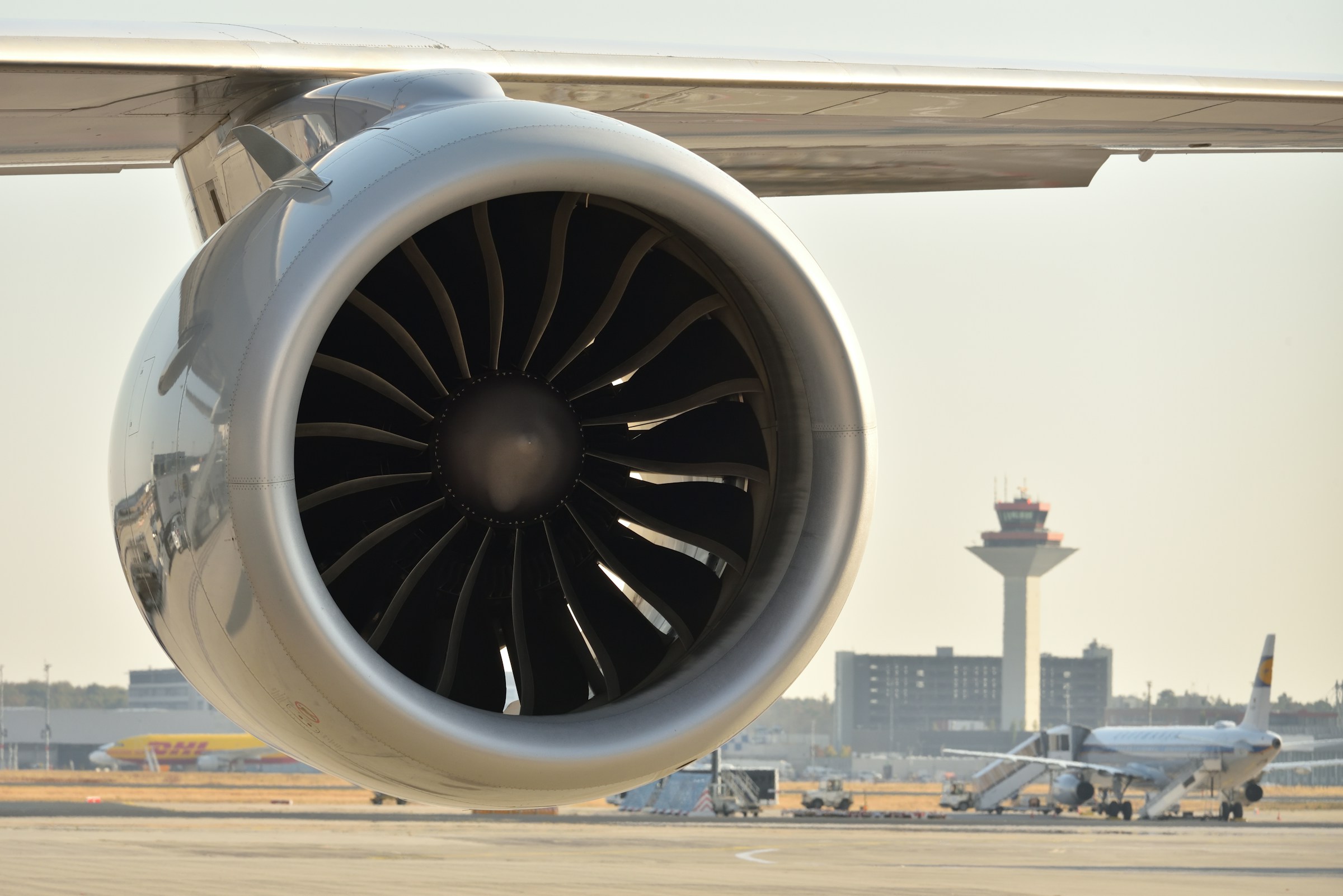 Wing-mounted jet engine on aircraft