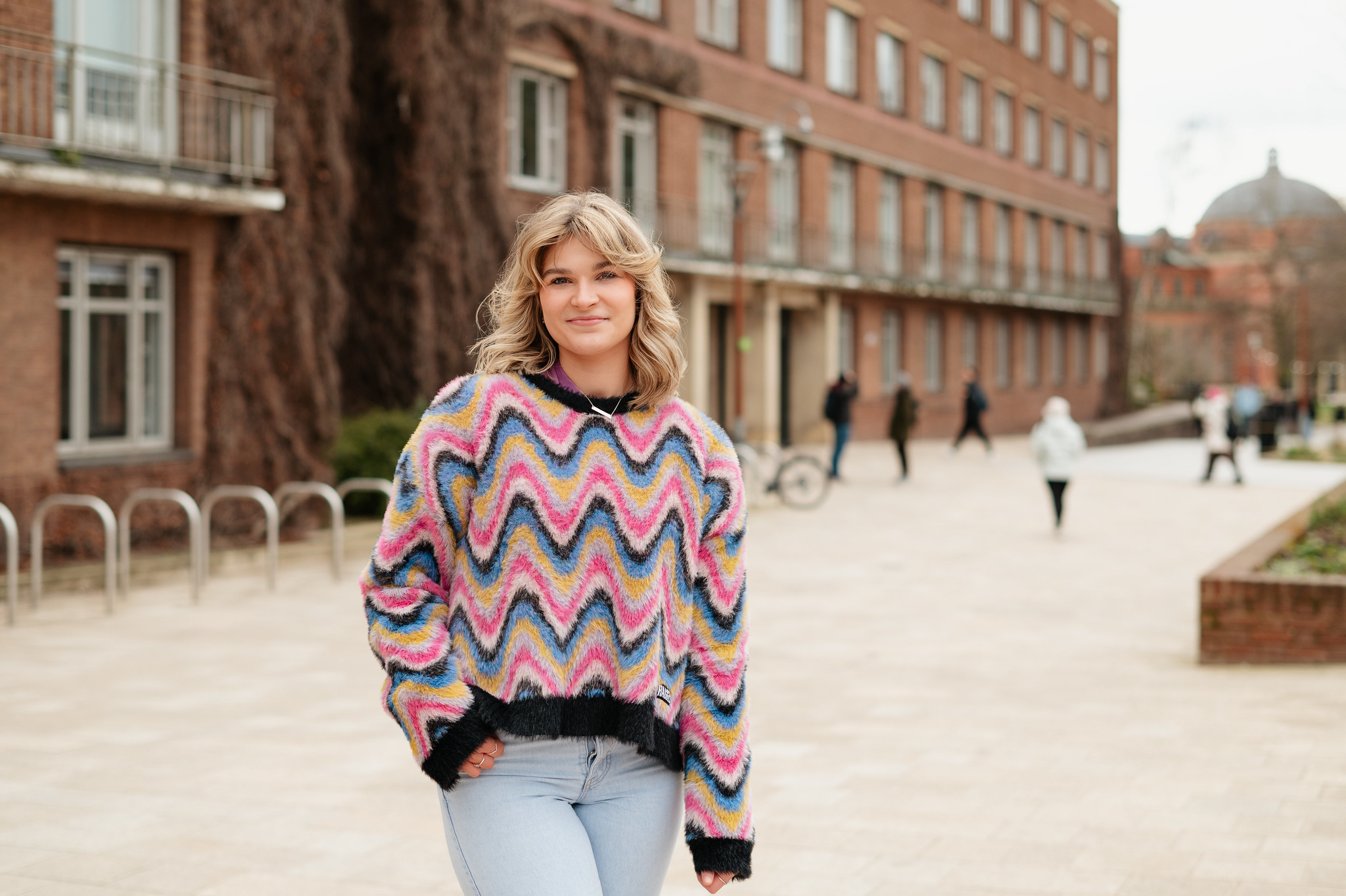 Photo of Aoife in front of Arts Building