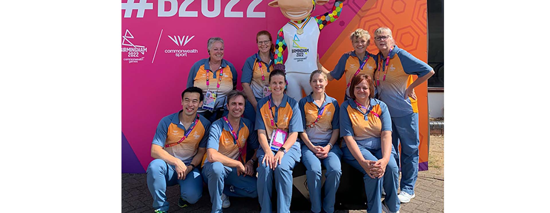 Venue Medical Managers posing with a statue of Perry, the Commonwealth Games Mascot.