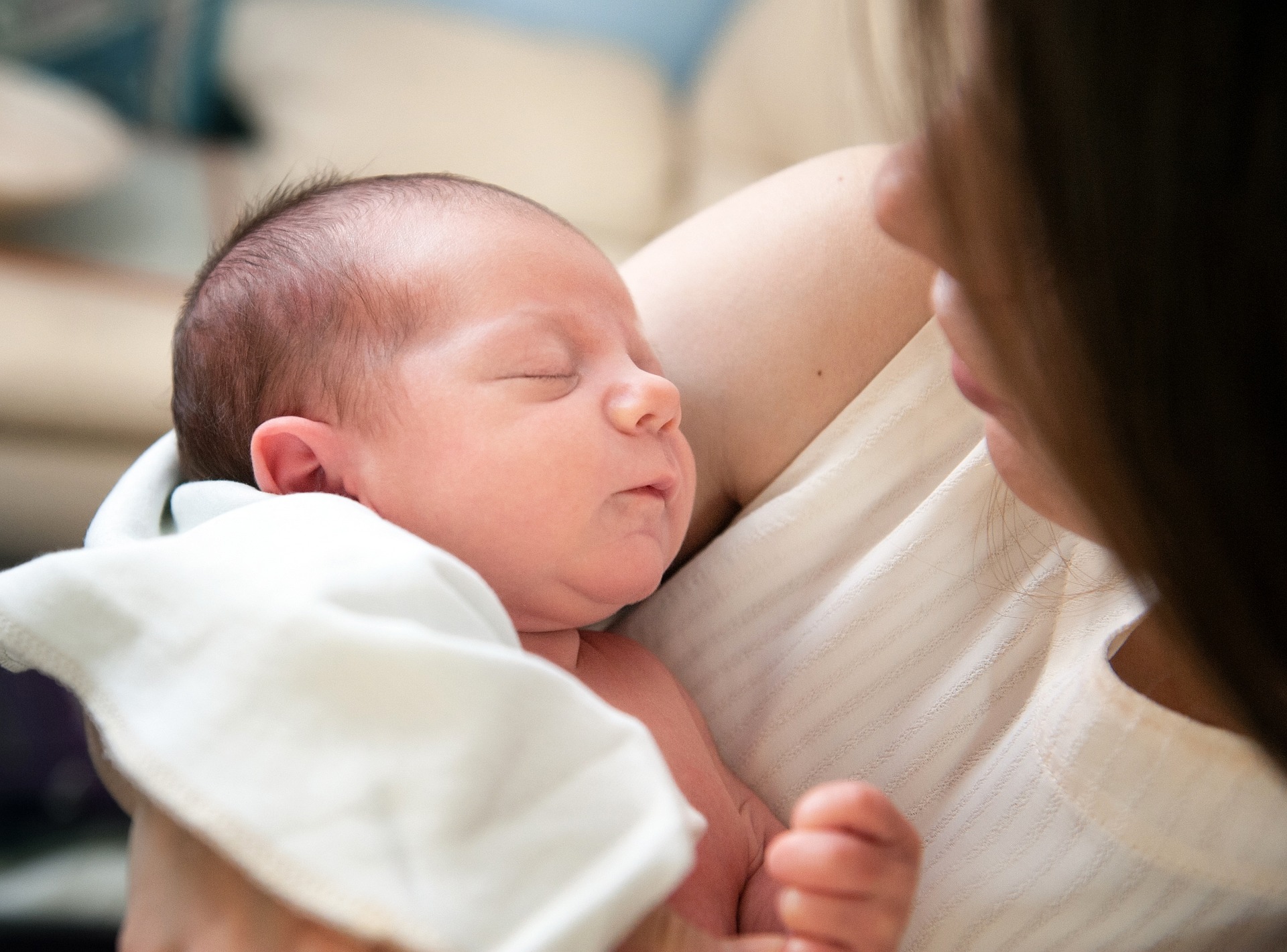 Mother holding a newboard baby