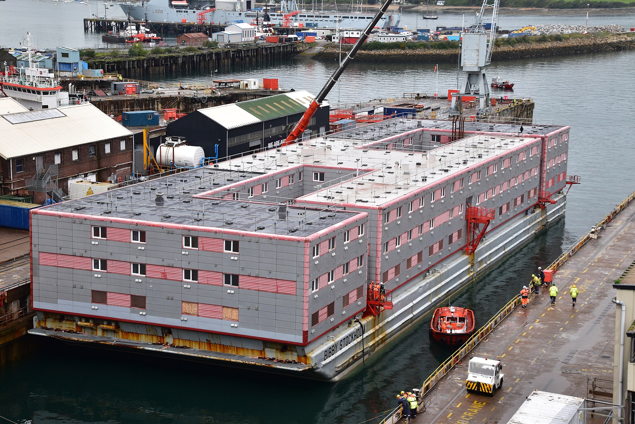 Bibby Stockholm, an engineless barge at Falmouth Docks in 2023.