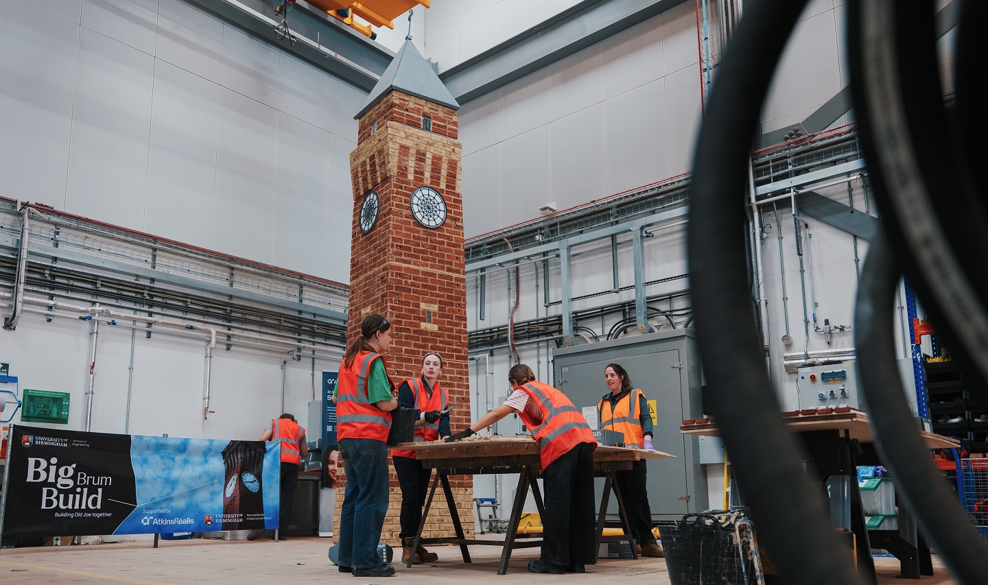Students at work constructing model clock tower