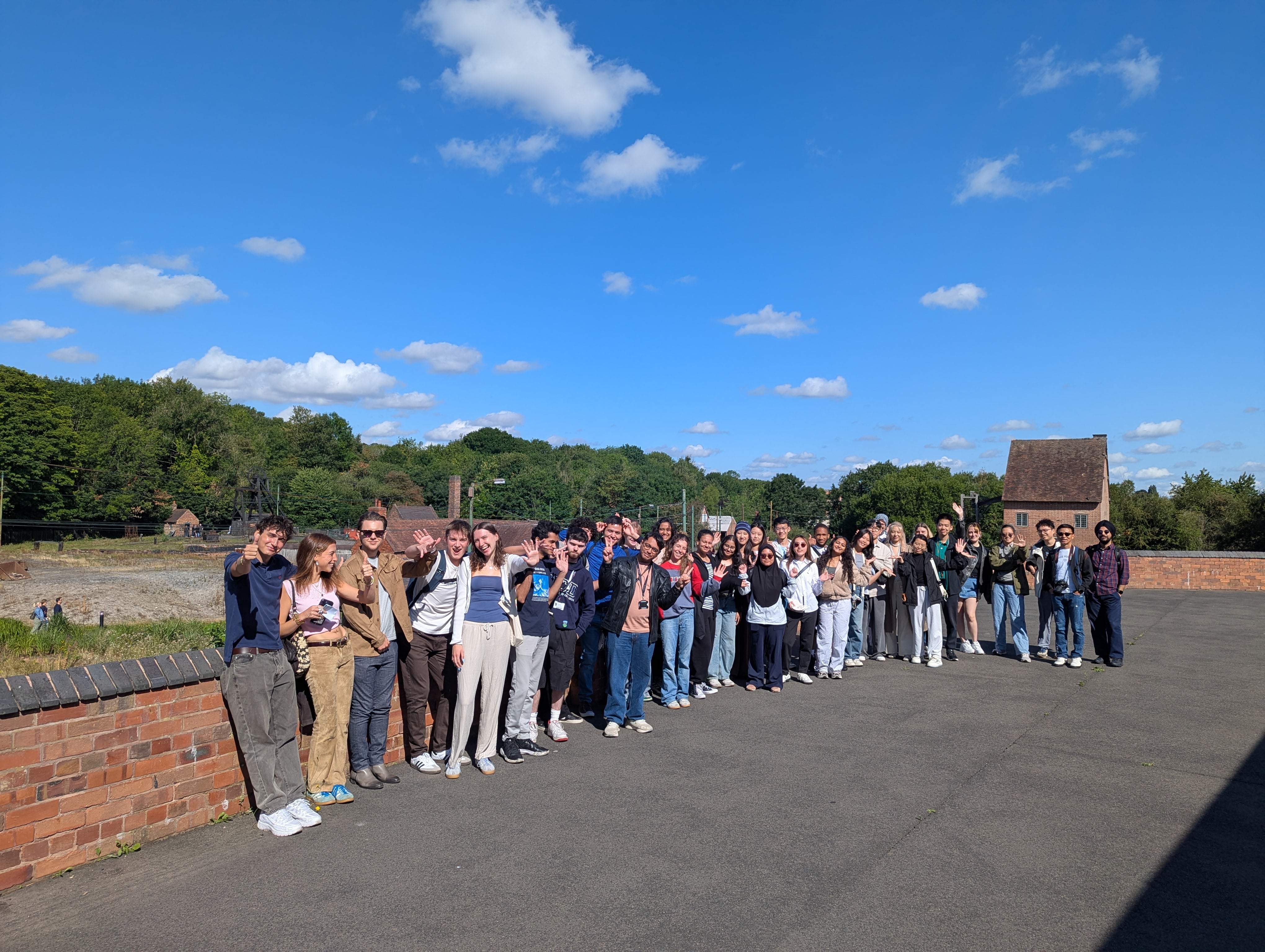Summer school student group posing for picture on a sunny day
