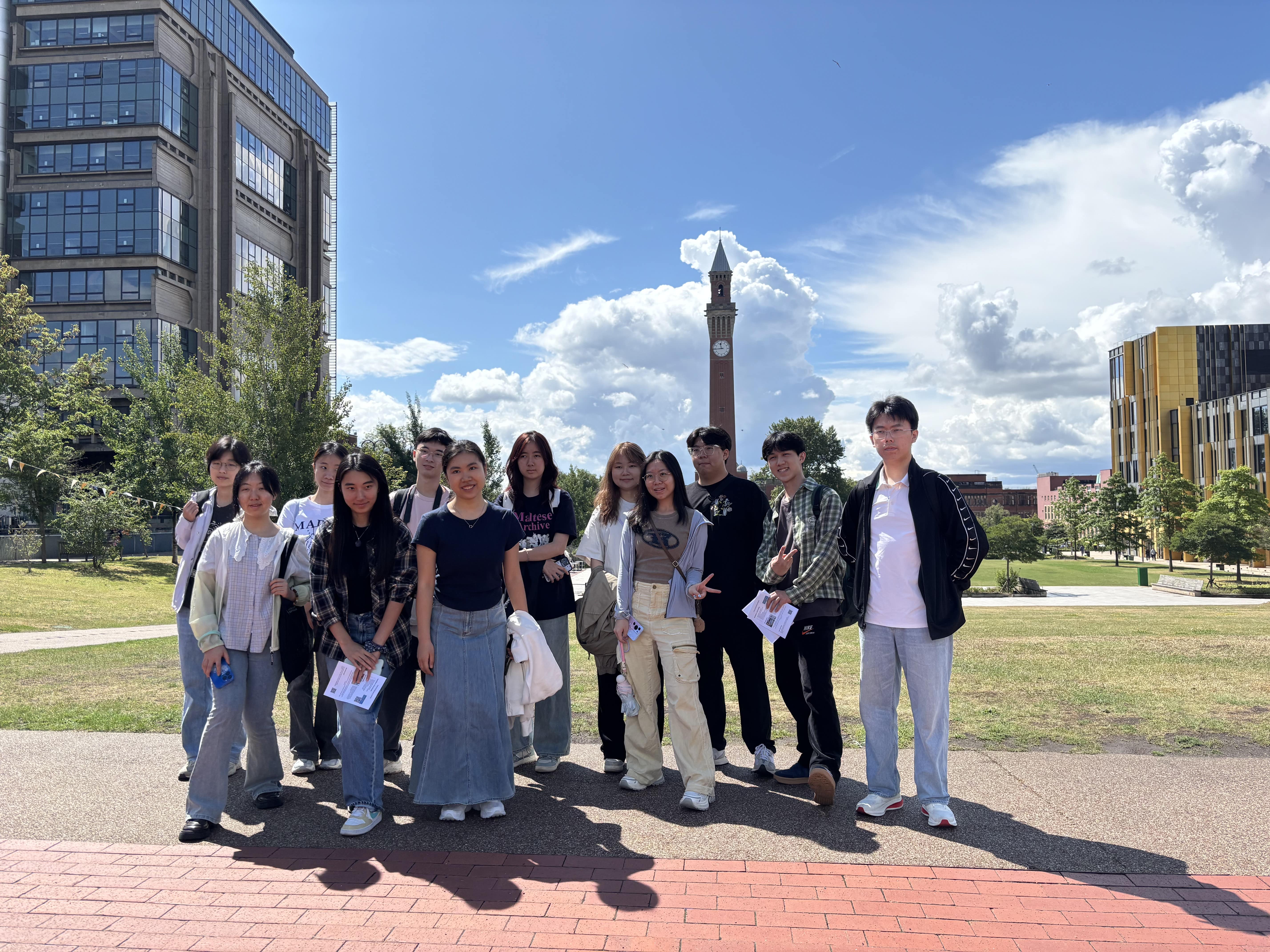 Summer school students posing for the camera on a University of Birmingham campus