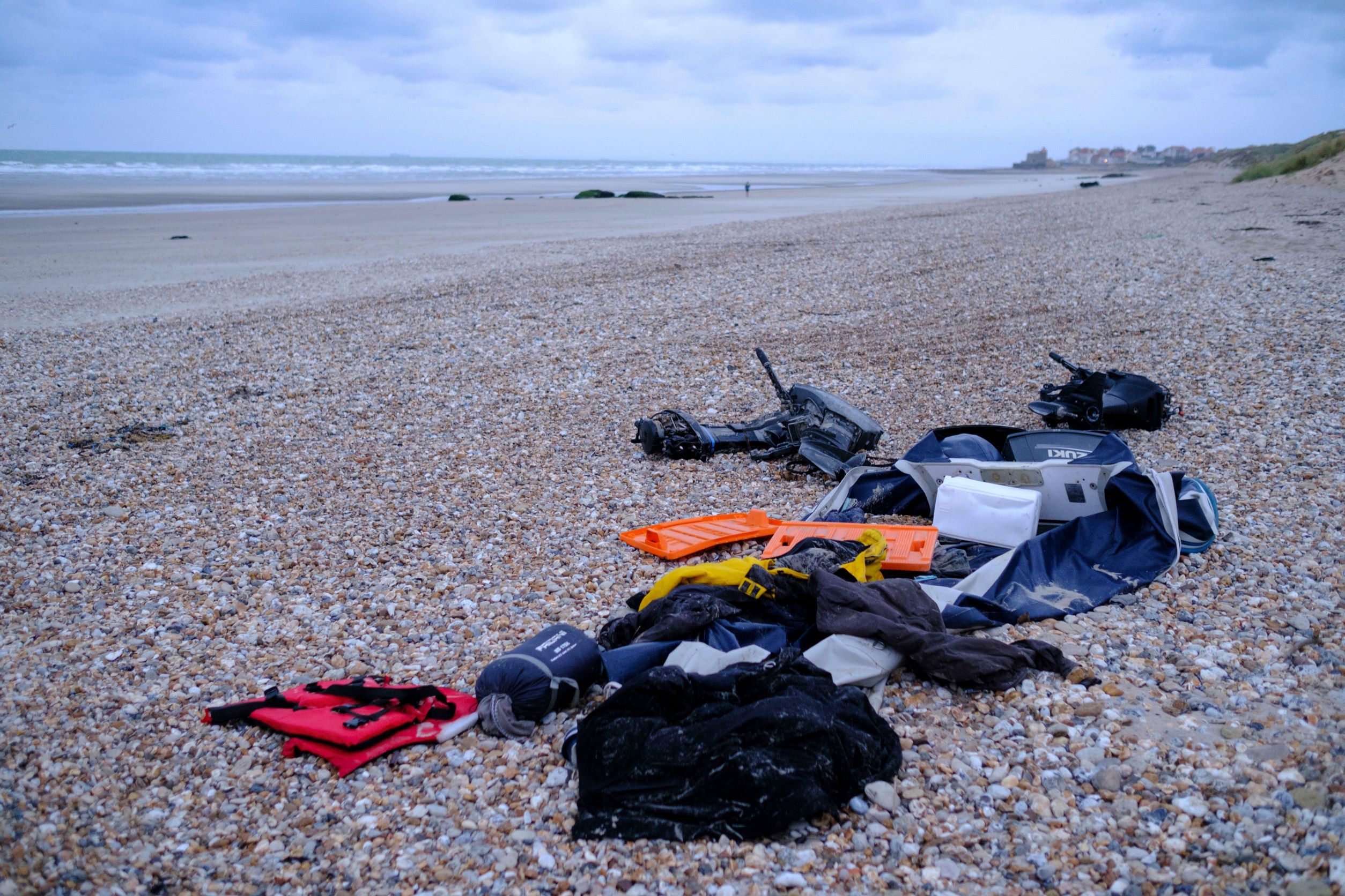 Boat items washed ashore on a beach in France