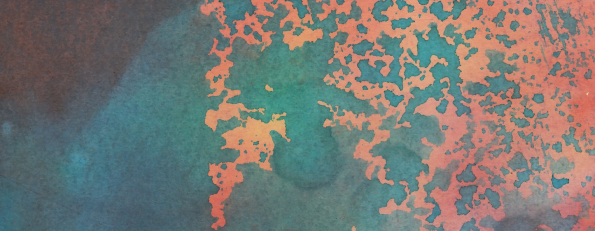 A stylised global map in orange set against a blue-green background