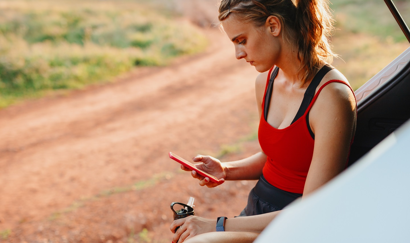 Female runner using phone