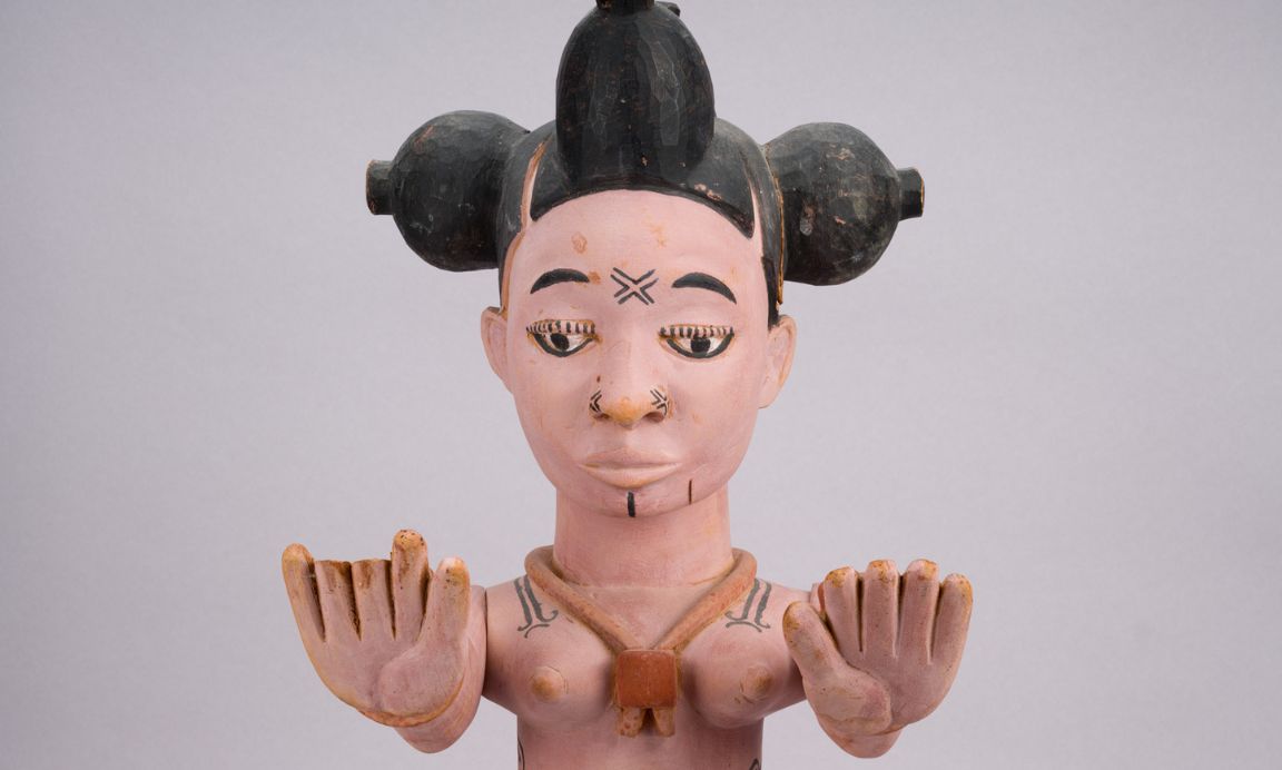One of the figurines depicting a maiden on her ceremonial emergence from the ‘fattening room’.