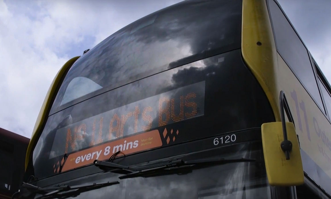 Front of a bus showing No11 Arts Bus as the destination