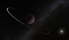 an image of a ring system around a dwarf planet