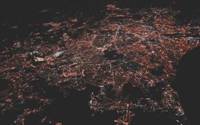 Aerial view of networks across a city at night